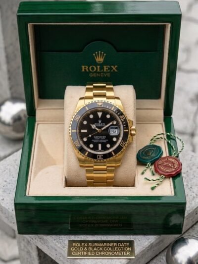 Rolex Submariner Gold & Black Dial
